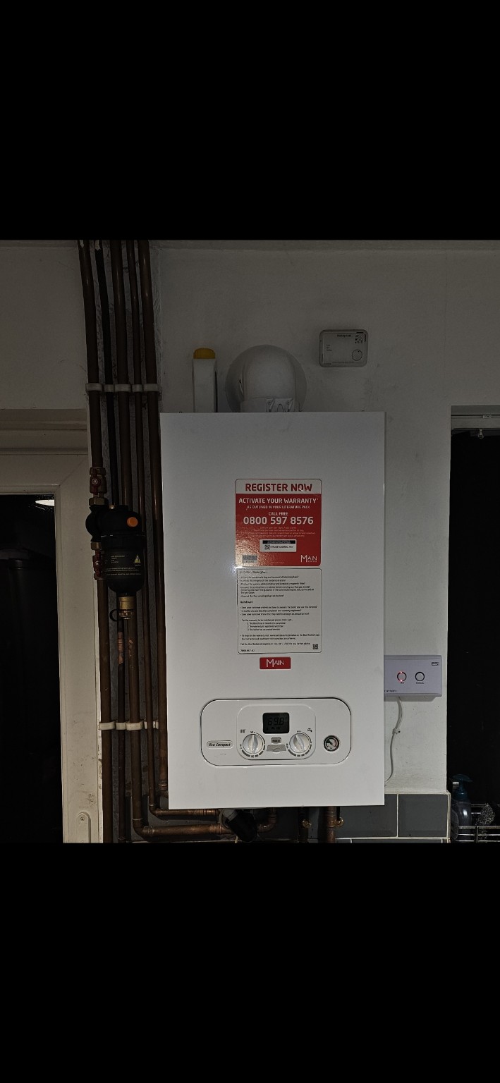 Main Eco Compact boiler installation with exposed vertical pipework by Luk Gas Ltd